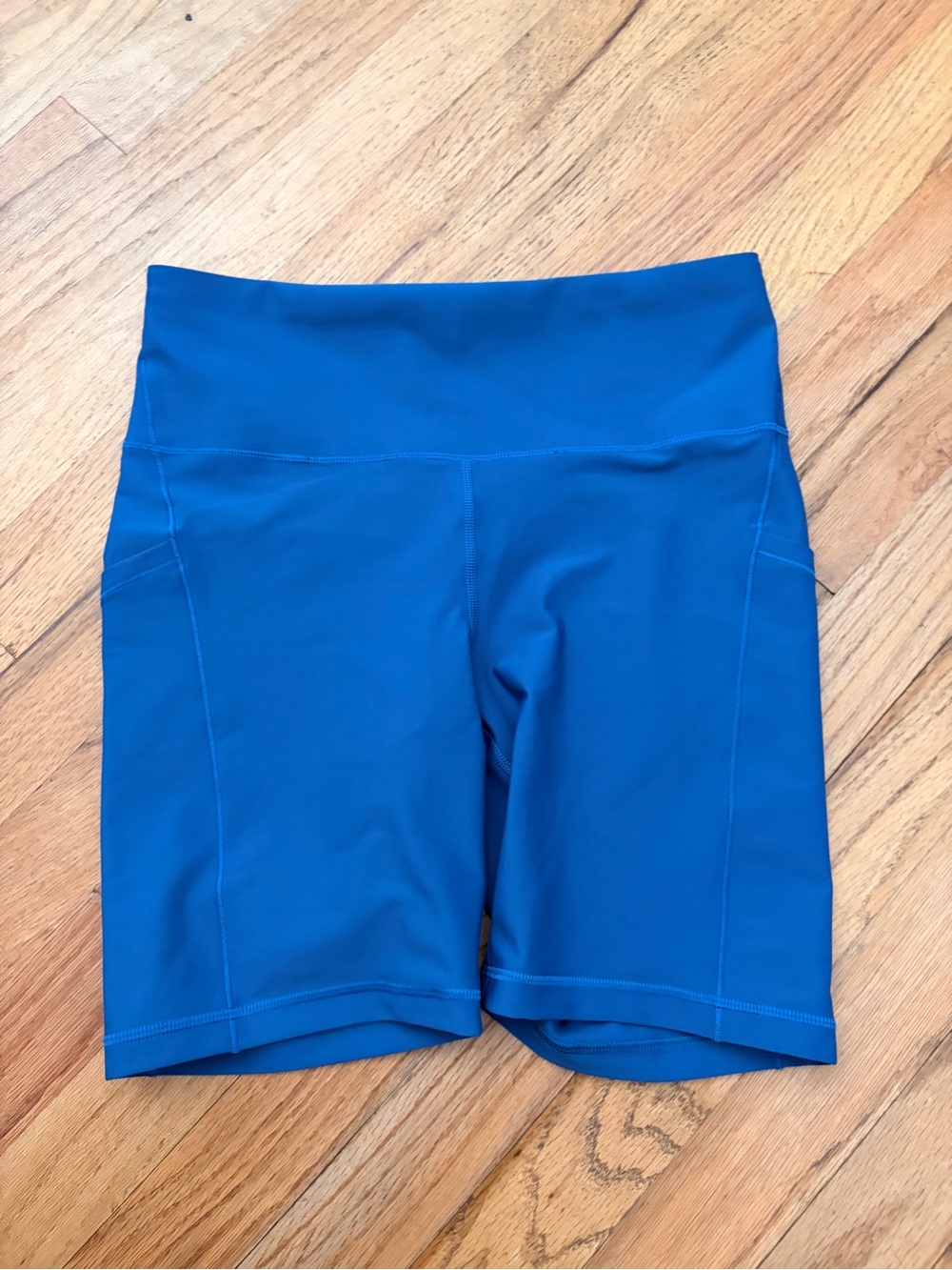 Athleta Interval Stash 7” Short Biker Shorts Pocket Medium Blue
